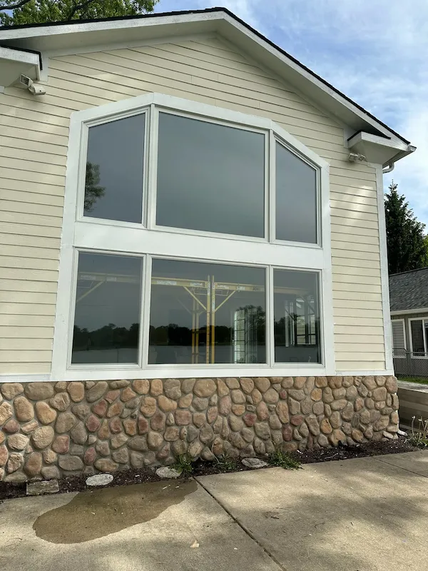 Completed two-story feature windows with exterior trim